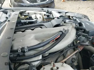 ✅ 2004 Lincoln LS Luxury • VIN: 1LNHM86S84Y603232 • Lot: 43287383. Wystawiony na IAAI z przebiegiem 99 667 mil. Bezpłatny archiwum sprzedaży aukcyjnych z USA i szczegółowy raport historii pojazdu na DreamBid. Zdjęcie 13.