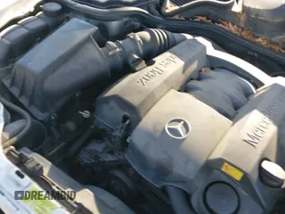 ✅ 2000 Mercedes-Benz E 320/430 4 Matic • VIN: WDBJH82JXYX039228 • Lot: 42584444. Listed on IAAI with 215,978 mi. Free auction sales archive from the USA and detailed vehicle history report at DreamBid. Image 12.