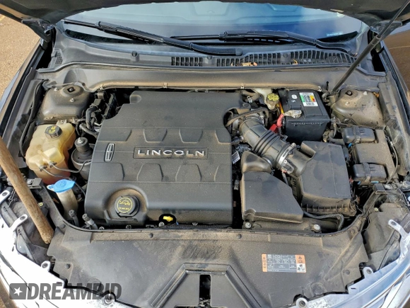 ✅ 2015 Lincoln MKZ • VIN: 3LN6L2GK3FR607888 • Lot: 96903715. Wystawiony na Copart z przebiegiem 66 682 mil. Bezpłatny archiwum sprzedaży aukcyjnych z USA i szczegółowy raport historii pojazdu na DreamBid. Zdjęcie 11.