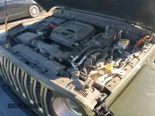 ✅ 2023 Jeep Wrangler Sahara • VIN: 1C4JJXP60PW568499 • Лот: 87244015. Опубликован ранее на Copart с пробегом 59 334 миль. Бесплатный доступ к архиву аукционных продаж из США и подробный отчёт об истории автомобиля на DreamBid. Изображение 14.