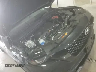 ✅ 2025 Mazda CX-50 Hybrid Premium Package • VIN: 7MMVAADW9SN125303 • Lot: 80655325. Listed on Copart with 3,864 mi. Free auction sales archive from the USA and detailed vehicle history report at DreamBid. Image 15.