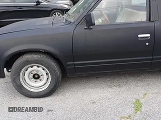 ✅ 1985 Nissan 720 • VIN: 1N6ND01S1FC318854 • Лот: 61226215. Опубликован ранее на Copart с пробегом 164 219 миль. Бесплатный доступ к архиву аукционных продаж из США и подробный отчёт об истории автомобиля на DreamBid. Изображение 11.