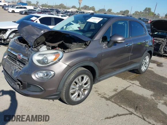 ✅ 2016 FIAT 500X Easy • VIN: ZFBCFXBT9GP361887 • Лот: 43165732. Опубліковано раніше на IAAI з пробігом 70 083 миль. Безкоштовний доступ до архіву аукціонних продажів зі США та докладний звіт про історію автомобіля на DreamBid. Зображення 2.