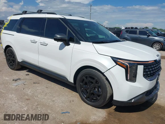 ✅ 2025 Kia Carnival SX • VIN: KNDNE5KA1S6071797 • Lot: 45286346. Listed on IAAI with 16,884 mi. Free auction sales archive from the USA and detailed vehicle history report at DreamBid. Image 1.