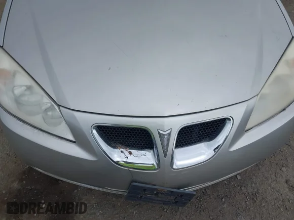 ✅ 2008 Pontiac G6 • VIN: 1G2ZG57N084197181 • Lot: 42221282. Wystawiony na IAAI z przebiegiem 145 348 mil. Bezpłatny archiwum sprzedaży aukcyjnych z USA i szczegółowy raport historii pojazdu na DreamBid. Zdjęcie 6.