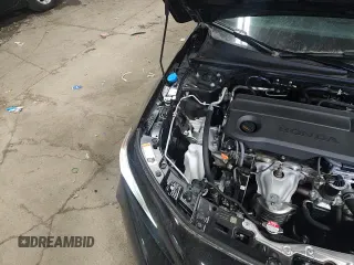 ✅ 2025 Honda Civic LX • VIN: 2HGFE2F23SH602522 • Lot: 94229665. Wystawiony na Copart z przebiegiem 12 081 mil. Bezpłatny archiwum sprzedaży aukcyjnych z USA i szczegółowy raport historii pojazdu na DreamBid. Zdjęcie 13.