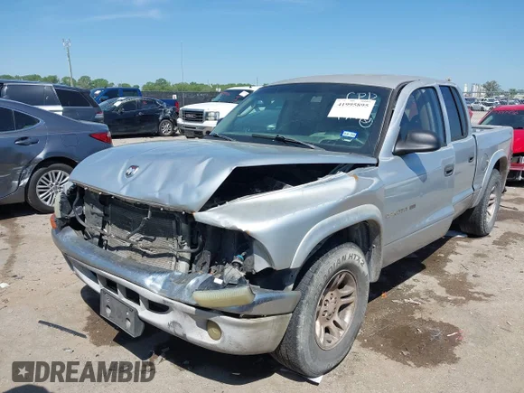 ✅ 2002 Dodge Dakota • VIN: 1B7HL48Z92S668049 • Lot: 41995895. Wystawiony na IAAI z przebiegiem 439 857 mil. Bezpłatny archiwum sprzedaży aukcyjnych z USA i szczegółowy raport historii pojazdu na DreamBid. Zdjęcie 2.