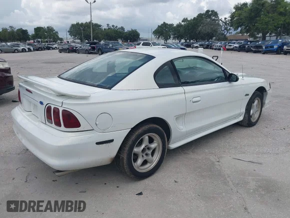 ✅ 1997 Ford Mustang GT • VIN: 1FALP42X8VF152984 • Lot: 42738292. Wystawiony na IAAI z przebiegiem 92 002 mil. Bezpłatny archiwum sprzedaży aukcyjnych z USA i szczegółowy raport historii pojazdu na DreamBid. Zdjęcie 4.