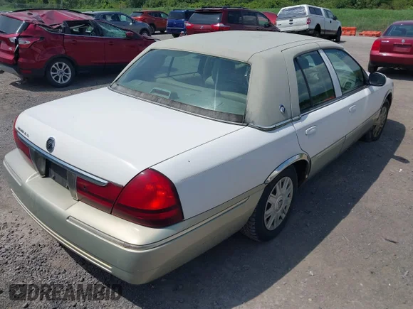 ✅ 2004 Mercury Grand Marquis GS • VIN: 2MEFM74W44X673224 • Lot: 40670734. Wystawiony na IAAI z przebiegiem 83 219 mil. Bezpłatny archiwum sprzedaży aukcyjnych z USA i szczegółowy raport historii pojazdu na DreamBid. Zdjęcie 4.