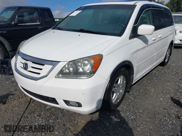 ✅ 2008 Honda Odyssey Touring • VIN: 5FNRL38848B007539 • Lot: 43796914. Listed on IAAI with 169,825 mi. Free auction sales archive from the USA and detailed vehicle history report at DreamBid. Image 2.
