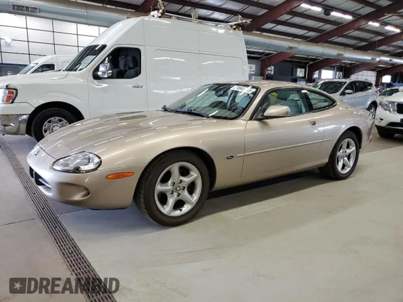 ✅ 2000 Jaguar XK • VIN: SAJJA41C8YNA00672 • Лот: 71646755. Опубліковано раніше на Copart з пробігом 114 082 миль. Безкоштовний доступ до архіву аукціонних продажів зі США та докладний звіт про історію автомобіля на DreamBid. Зображення 1.