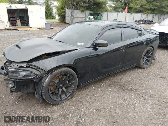 ✅ 2015 Dodge Charger RT • VIN: 2C3CDXCT0FH871151 • Lot: 45000231. Wystawiony na IAAI z przebiegiem 104 966 mil. Bezpłatny archiwum sprzedaży aukcyjnych z USA i szczegółowy raport historii pojazdu na DreamBid. Zdjęcie 2.