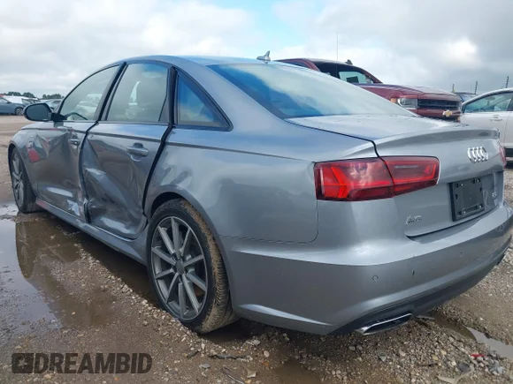 ✅ 2018 Audi A6 Premium • VIN: WAUF8AFC6JN104911 • Lot: 42813336. Wystawiony na IAAI z przebiegiem 53 214 mil. Bezpłatny archiwum sprzedaży aukcyjnych z USA i szczegółowy raport historii pojazdu na DreamBid. Zdjęcie 3.