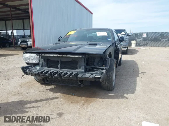 ✅ 2014 Dodge Challenger Rallye Redline • VIN: 2C3CDYAGXEH190554 • Лот: 44629446. Опубліковано раніше на IAAI з пробігом 98 919 миль. Безкоштовний доступ до архіву аукціонних продажів зі США та докладний звіт про історію автомобіля на DreamBid. Зображення 6.