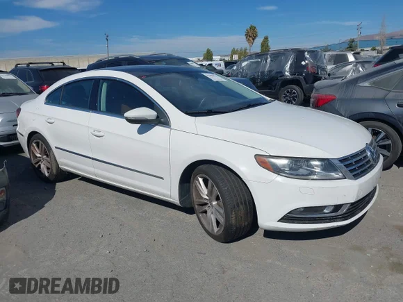 ✅ 2014 Volkswagen CC Executive • VIN: WVWRP7AN4EE507919 • Lot: 42990421. Listed on IAAI with 106,338 mi. Free auction sales archive from the USA and detailed vehicle history report at DreamBid. Image 1.