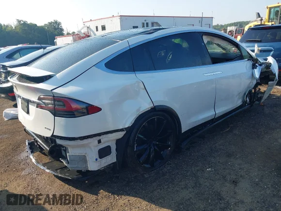 ✅ 2018 Tesla Model X 75D • VIN: 5YJXCBE23JF100303 • Лот: 42666935. Опубліковано раніше на IAAI з пробігом Не вказано. Безкоштовний доступ до архіву аукціонних продажів зі США та докладний звіт про історію автомобіля на DreamBid. Зображення 4.