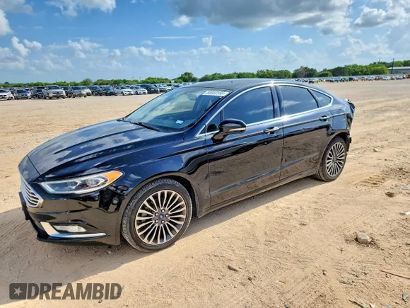 ✅ 2018 Ford Fusion Titanium • VIN: 3FA6P0D91JR137437 • Lot: 56959166. Wystawiony na Copart z przebiegiem 125 907 mil. Bezpłatny archiwum sprzedaży aukcyjnych z USA i szczegółowy raport historii pojazdu na DreamBid. Zdjęcie 1.