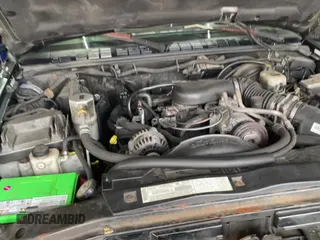 2003 Chevrolet Blazer LS z VIN 1GNCT18X83K175026, wystawiony jako Copart lot #69479335 z przebiegiem 200 297 mil mil oraz Czysty tytuł • Clean title. Historia ofert i sprzedaży dostępna na DreamBid. Obrazek 11.