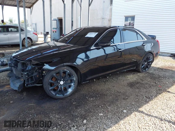 ✅ 2015 Cadillac CTS Vsport Premium RWD • VIN: 1G6AV5S85F0128090 • Lot: 42895791. Listed on IAAI with 98,788 mi. Free auction sales archive from the USA and detailed vehicle history report at DreamBid. Image 2.