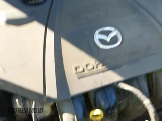 ✅ 2005 Mazda 3 i • VIN: JM1BK12F951314175 • Лот: 41097728. Опубликован ранее на IAAI с пробегом 243 085 миль. Бесплатный доступ к архиву аукционных продаж из США и подробный отчёт об истории автомобиля на DreamBid. Изображение 18.