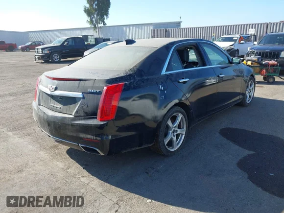✅ 2016 Cadillac CTS Luxury Collection AWD • VIN: 1G6AX5SX1G0136142 • Lot: 43817102. Listed on IAAI with 96,897 mi. Free auction sales archive from the USA and detailed vehicle history report at DreamBid. Image 4.