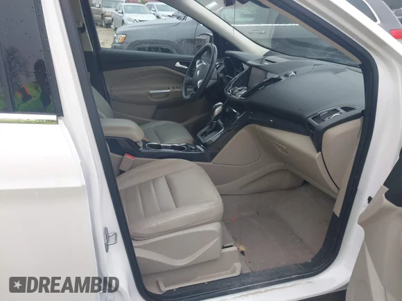 ✅ 2014 Ford Escape Titanium • VIN: 1FMCU0JX5EUA20933 • Lot: 41611687. Wystawiony na IAAI z przebiegiem 91 016 mil. Bezpłatny archiwum sprzedaży aukcyjnych z USA i szczegółowy raport historii pojazdu na DreamBid. Zdjęcie 5.