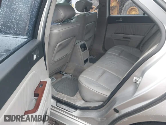 ✅ 2005 Cadillac STS • VIN: 1G6DW677350165850 • Lot: 41563558. Listed on IAAI with 175,344 mi. Free auction sales archive from the USA and detailed vehicle history report at DreamBid. Image 8.