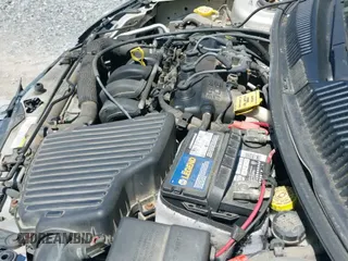 2004 Dodge Neon SXT z VIN 1B3ES56C44D580657, wystawiony jako IAAI lot #42137299 z przebiegiem 138 918 mil mil oraz . Historia ofert i sprzedaży dostępna na DreamBid. Obrazek 19.