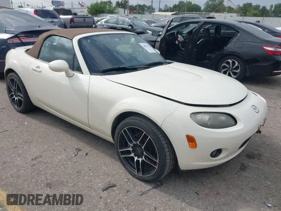 ✅ 2006 Mazda MX-5 Miata Touring • VIN: JM1NC25FX60116594 • Лот: 44874670. Опубликован ранее на IAAI с пробегом 79 664 миль. Бесплатный доступ к архиву аукционных продаж из США и подробный отчёт об истории автомобиля на DreamBid. Изображение 1.