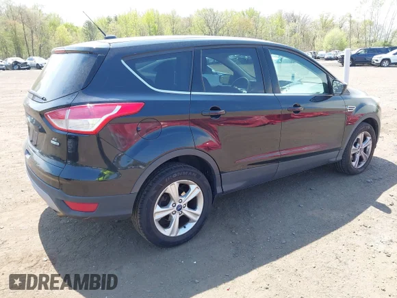 ✅ 2016 Ford Escape SE • VIN: 1FMCU9GX6GUA48187 • Lot: 44952712. Listed on IAAI with 156,188 mi. Free auction sales archive from the USA and detailed vehicle history report at DreamBid. Image 4.