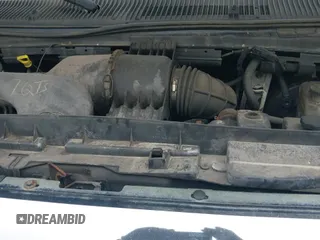 ✅ 2009 Ford Econoline Cargo Commercial • VIN: 1FTNE24W09DA82562 • Lot: 42701633. Listed on IAAI with 214,815 mi. Free auction sales archive from the USA and detailed vehicle history report at DreamBid. Image 13.