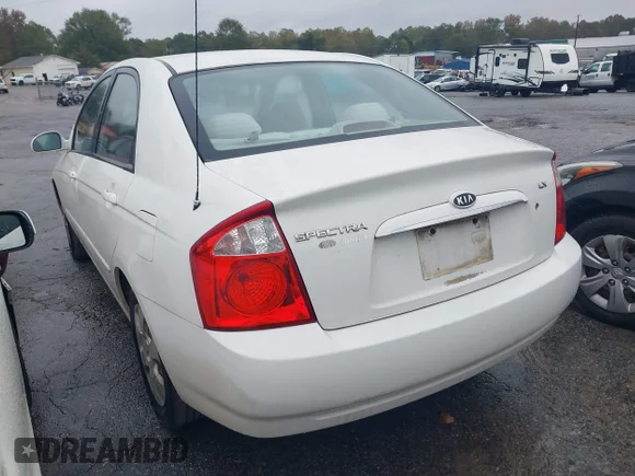 ✅ 2004 Kia Spectra LX • VIN: KNAFE121745036328 • Лот: 43514623. Опубликован ранее на IAAI с пробегом 131 119 миль. Бесплатный доступ к архиву аукционных продаж из США и подробный отчёт об истории автомобиля на DreamBid. Изображение 3.