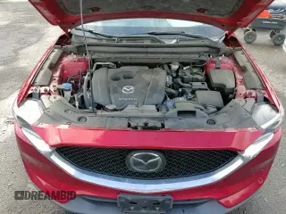 ✅ 2021 Mazda CX-5 Grand Touring • VIN: JM3KFBDM8M0320552 • Лот: 91934415. Опубликован ранее на Copart с пробегом 91 303 миль. Бесплатный доступ к архиву аукционных продаж из США и подробный отчёт об истории автомобиля на DreamBid. Изображение 15.