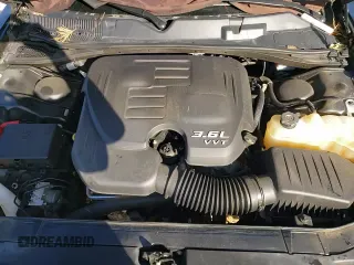 ✅ 2022 Dodge Challenger GT • VIN: 2C3CDZJG0NH174711 • Lot: 71786045. Wystawiony na Copart z przebiegiem 58 750 mil. Bezpłatny archiwum sprzedaży aukcyjnych z USA i szczegółowy raport historii pojazdu na DreamBid. Zdjęcie 13.