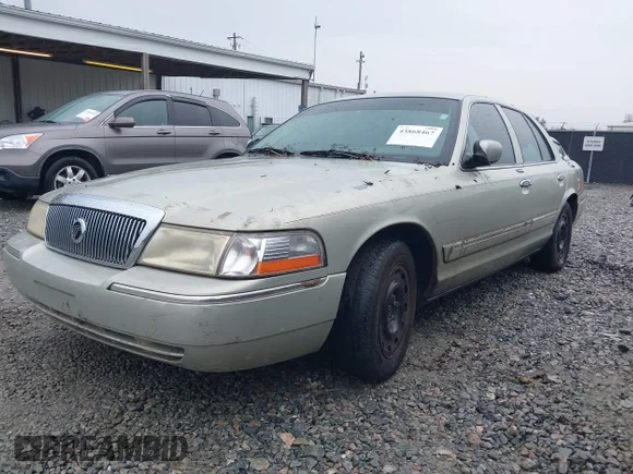 ✅ 2004 Mercury Grand Marquis GS • VIN: 2MEFM74W44X661574 • Lot: 43868467. Wystawiony na IAAI z przebiegiem 179 063 mil. Bezpłatny archiwum sprzedaży aukcyjnych z USA i szczegółowy raport historii pojazdu na DreamBid. Zdjęcie 2.