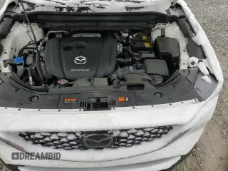 ✅ 2022 Mazda CX-5 S Carbon Edition • VIN: JM3KFBCM7N1585685 • Лот: 91687755. Опубликован ранее на Copart с пробегом 37 676 миль. Бесплатный доступ к архиву аукционных продаж из США и подробный отчёт об истории автомобиля на DreamBid. Изображение 14.