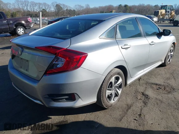 ✅ 2020 Honda Civic LX • VIN: 2HGFC2F62LH597940 • Lot: 43913614. Listed on IAAI with 68,048 mi. Free auction sales archive from the USA and detailed vehicle history report at DreamBid. Image 4.