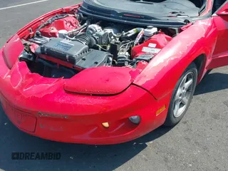 ✅ 2002 Pontiac Firebird Firebird • VIN: 2G2FS22K122169318 • Лот: 40006885. Опубликован ранее на IAAI с пробегом 115 799 миль. Бесплатный доступ к архиву аукционных продаж из США и подробный отчёт об истории автомобиля на DreamBid. Изображение 14.