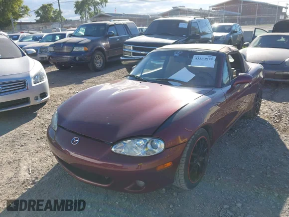 ✅ 2003 Mazda MX-5 Miata Cloth • VIN: JM1NB353730304368 • Лот: 43333978. Опубліковано раніше на IAAI з пробігом 81 555 миль. Безкоштовний доступ до архіву аукціонних продажів зі США та докладний звіт про історію автомобіля на DreamBid. Зображення 6.
