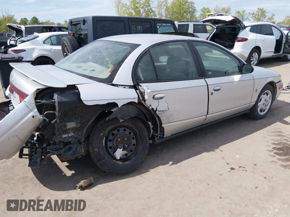 ✅ 2002 Saturn SL • VIN: 1G8ZJ52772Z160767 • Lot: 45110161. Listed on IAAI with 163,250 mi. Free auction sales archive from the USA and detailed vehicle history report at DreamBid. Image 4.