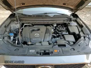 ✅ 2020 Mazda CX-5 Grand Touring • VIN: JM3KFBDM1L0847931 • Лот: 80466575. Опубликован ранее на Copart с пробегом 71 114 миль. Бесплатный доступ к архиву аукционных продаж из США и подробный отчёт об истории автомобиля на DreamBid. Изображение 16.