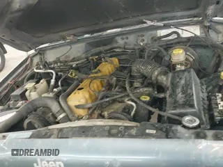 ✅ 1998 Jeep Cherokee Sport • VIN: 1J4FJ68S5WL284937 • Lot: 41984490. Listed on IAAI with 259,716 mi. Free auction sales archive from the USA and detailed vehicle history report at DreamBid. Image 20.