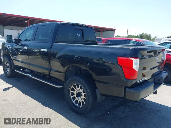✅ 2017 Nissan Titan Platinum Reserve • VIN: 1N6BA1F41HN557629 • Lot: 42327788. Wystawiony na IAAI z przebiegiem 150 207 mil. Bezpłatny archiwum sprzedaży aukcyjnych z USA i szczegółowy raport historii pojazdu na DreamBid. Zdjęcie 3.
