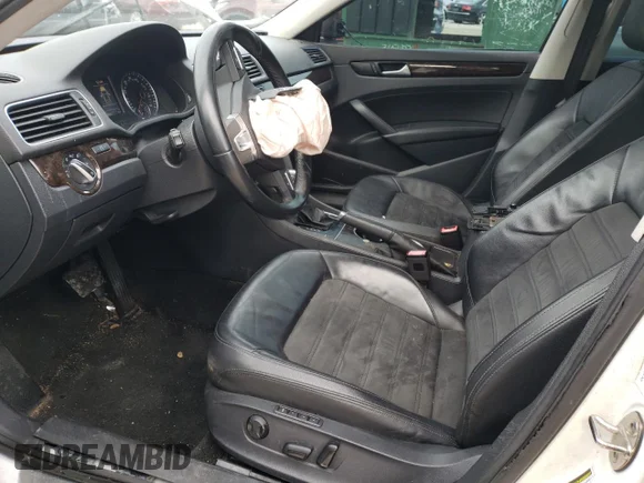 ✅ 2015 Volkswagen Passat SEL Premium • VIN: 1VWCM7A32FC060708 • Lot: 36512713. Wystawiony na Copart z przebiegiem 69 991 mil. Bezpłatny archiwum sprzedaży aukcyjnych z USA i szczegółowy raport historii pojazdu na DreamBid. Zdjęcie 7.