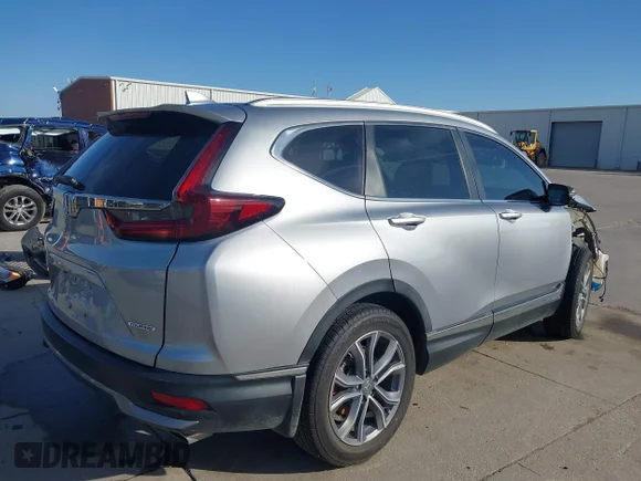 ✅ 2021 Honda CR-V Touring • VIN: 5J6RW1H96ML006110 • Lot: 44606707. Wystawiony na IAAI z przebiegiem 37 470 mil. Bezpłatny archiwum sprzedaży aukcyjnych z USA i szczegółowy raport historii pojazdu na DreamBid. Zdjęcie 4.