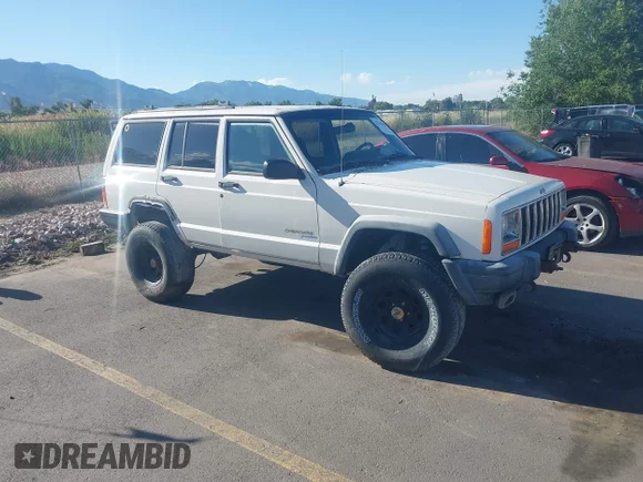 ✅ 2000 Jeep Cherokee • VIN: 1J4FF48S8YL211568 • Lot: 45216966. Listed on IAAI with 209,306 mi. Free auction sales archive from the USA and detailed vehicle history report at DreamBid. Image 1.
