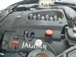 ✅ 2003 Jaguar XK • VIN: SAJDA42C732A35547 • Lot: 42090286. Listed on IAAI with 65,840 mi. Free auction sales archive from the USA and detailed vehicle history report at DreamBid. Image 16.