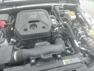 ✅ 2020 Jeep Wrangler Unlimited Sahara Altitude • VIN: 1C4HJXENXLW145237 • Lot: 81716495. Wystawiony na Copart z przebiegiem 146 038 mil. Bezpłatny archiwum sprzedaży aukcyjnych z USA i szczegółowy raport historii pojazdu na DreamBid. Zdjęcie 15.