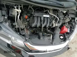 ✅ 2019 Honda Fit LX • VIN: 3HGGK5H49KM746235 • Лот: 56381755. Опубликован ранее на Copart с пробегом 117 106 миль. Бесплатный доступ к архиву аукционных продаж из США и подробный отчёт об истории автомобиля на DreamBid. Изображение 16.