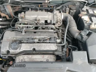 ✅ 2000 Mazda Protege DX • VIN: JM1BJ2222Y0263425 • Lot: 43747638. Wystawiony na IAAI z przebiegiem 144 157 mil. Bezpłatny archiwum sprzedaży aukcyjnych z USA i szczegółowy raport historii pojazdu na DreamBid. Zdjęcie 19.